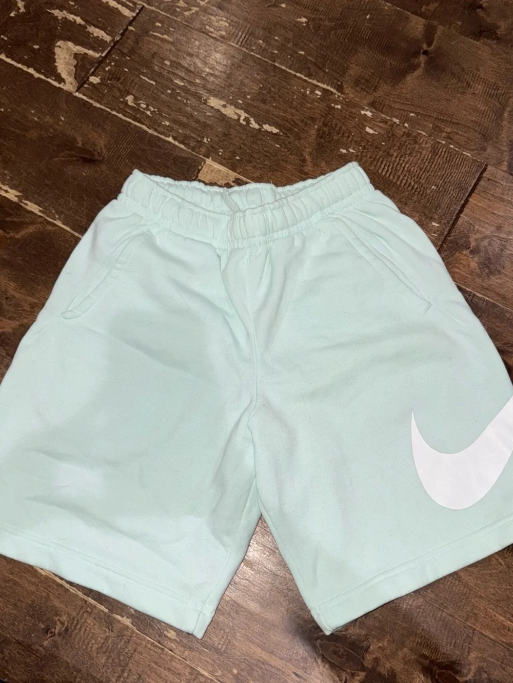 Nike Mint Green Mens Athletic Shorts with White Swoosh